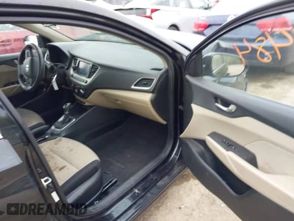 2019 Hyundai Accent SE z VIN 3KPC24A34KE060798, wystawiony jako IAAI lot #42117484 z przebiegiem 102 601 mil mil oraz . Historia ofert i sprzedaży dostępna na DreamBid. Obrazek 5.