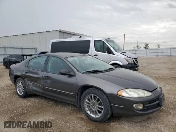 2004 Dodge Intrepid SE with VIN 2B3HD46R64H631021, listed as a Copart auction lot 85269635 with 121,632 mi miles and Salvage title. Bid and sale history available at DreamBid. Image 4.
