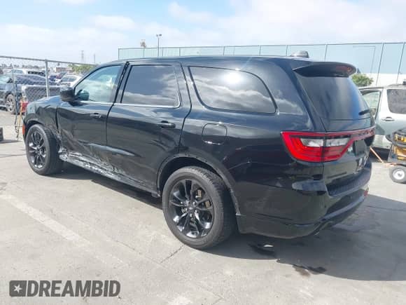 2022 Dodge Durango SXT with VIN 1C4RDHAG9NC159322, listed as a IAAI auction lot 42477809 with 82,361 mi miles and . Bid and sale history available at DreamBid. Image 3.