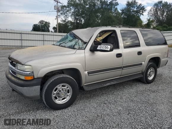 2004 Chevrolet Suburban LS z VIN 3GNGK26U24G257118, wystawiony jako Copart lot #74512764 z przebiegiem Nie podano mil oraz Szkoda całkowita • Salvage title. Historia ofert i sprzedaży dostępna na DreamBid. Obrazek 1.