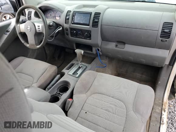 2010 Nissan Frontier SE with VIN 1N6BD0CT9AC442968, listed as a Copart auction lot 60814345 with 197,509 mi miles and Salvage title. Bid and sale history available at DreamBid. Image 8.