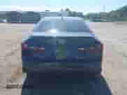 2025 Toyota Camry SE with VIN 4T1DAACK3SU564721, listed as a IAAI auction lot 43041281 with 34,950 mi miles and . Bid and sale history available at DreamBid. Image 16.