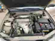 1996 Toyota Camry DX z VIN JT2BG12K4T0391773, wystawiony jako Copart lot #68545815 z przebiegiem 103 853 mil mil oraz Szkoda całkowita • Salvage title. Historia ofert i sprzedaży dostępna na DreamBid. Obrazek 11.