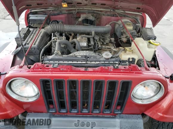 1998 Jeep Wrangler Sport z VIN 1J4FY19S9WP761133, wystawiony jako Copart lot #65012245 z przebiegiem 200 759 mil mil oraz Szkoda całkowita • Salvage title. Historia ofert i sprzedaży dostępna na DreamBid. Obrazek 12.