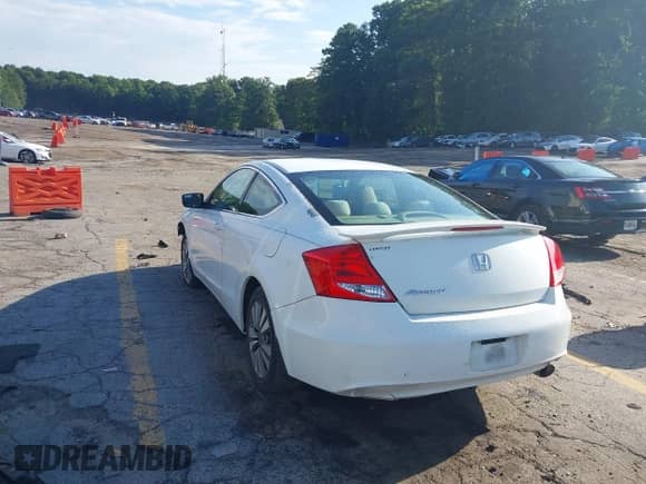 2011 Honda Accord LX-S with VIN 1HGCS1B32BA009799, listed as a IAAI auction lot 42696126 with 243,461 mi miles and . Bid and sale history available at DreamBid. Image 3.