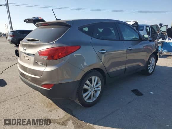 2011 Hyundai Tucson Limited с VIN KM8JU3AC7BU198425, выставлен на аукционе Copart как лот 81215945 с пробегом 114 776 миль миль и Списание • Salvage title. История ставок и продаж доступна на DreamBid. Изображение 3.