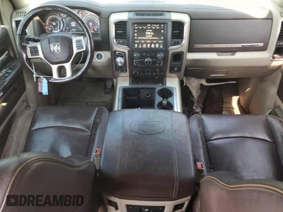 2014 Ram 1500 Longhorn z VIN 1C6RR7PT4ES378721, wystawiony jako Copart lot #67910635 z przebiegiem 184 101 mil mil oraz Szkoda całkowita • Salvage title. Historia ofert i sprzedaży dostępna na DreamBid. Obrazek 8.