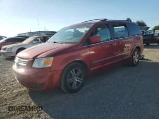 2010 Dodge Grand Caravan SXT with VIN 2D4RN5DX8AR128638, listed as a Copart auction lot 71561915 with 95,925 mi miles and Salvage title. Bid and sale history available at DreamBid. Image 1.