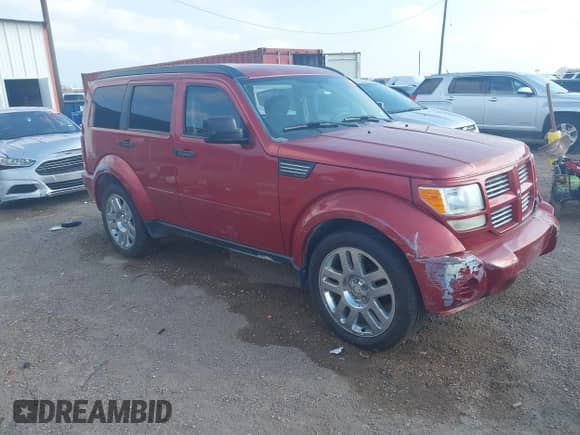 2010 Dodge Nitro Heat with VIN 1D4PT4GK9AW163221, listed as a IAAI auction lot 41502126 with 195,553 mi miles and . Bid and sale history available at DreamBid. Image 1.