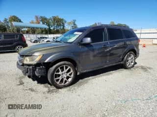 2015 Dodge Journey SXT with VIN 3C4PDDBG7FT538579, listed as a Copart auction lot 87099995 with 117,189 mi miles and Clean title. Bid and sale history available at DreamBid. Image 1.