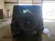 2012 Jeep Wrangler Sport with VIN 1C4AJWAG4CL215593, listed as a Copart auction lot 71013325 with 112,333 mi miles and Salvage title. Bid and sale history available at DreamBid. Image 6.