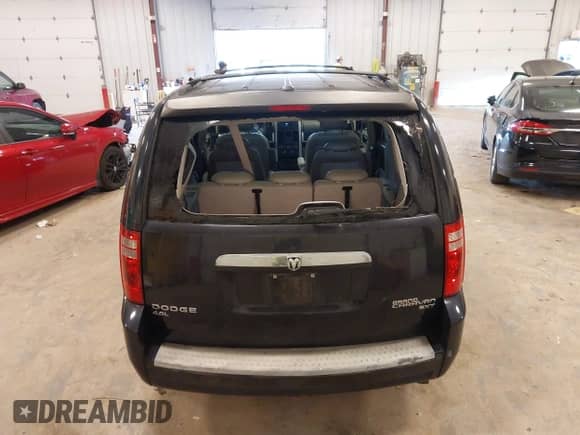 2010 Dodge Grand Caravan SXT with VIN 2D4RN5DXXAR252457, listed as a IAAI auction lot 43175672 with 103,944 mi miles and . Bid and sale history available at DreamBid. Image 16.