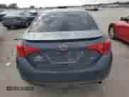 2019 Toyota Corolla L z VIN 5YFBURHEXKP887746, wystawiony jako Copart lot #71908705 z przebiegiem 98 321 mil mil oraz Szkoda całkowita • Salvage title. Historia ofert i sprzedaży dostępna na DreamBid. Obrazek 6.