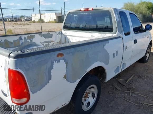 2002 Ford F-150 XL with VIN 1FTRX17252KA55387, listed as a IAAI auction lot 43454256 with 162,516 mi miles and . Bid and sale history available at DreamBid. Image 13.