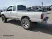 1997 Toyota Tacoma z VIN 4TAWN72N4VZ239482, wystawiony jako Copart lot #56564145 z przebiegiem 151 318 mil mil oraz Szkoda całkowita • Salvage title. Historia ofert i sprzedaży dostępna na DreamBid. Obrazek 2.