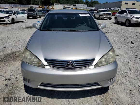 2006 Toyota Camry LE с VIN 4T1BE32K46U145551, выставлен на аукционе Copart как лот 70001745 с пробегом 198 337 миль миль и Списание • Salvage title. История ставок и продаж доступна на DreamBid. Изображение 5.