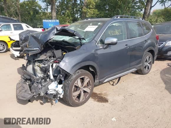 2021 Subaru Forester Touring z VIN JF2SKAXC8MH541542, wystawiony jako IAAI lot #43201822 z przebiegiem 89 359 mil mil oraz . Historia ofert i sprzedaży dostępna na DreamBid. Obrazek 2.