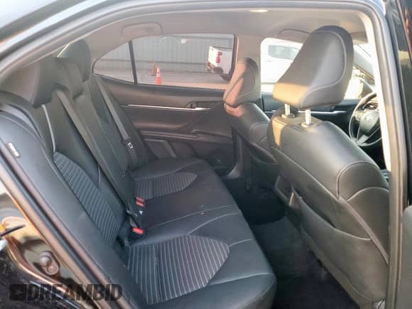 2023 Toyota Camry SE z VIN 4T1G11AKXPU798958, wystawiony jako Copart lot #81294885 z przebiegiem 67 379 mil mil oraz Szkoda całkowita • Salvage title. Historia ofert i sprzedaży dostępna na DreamBid. Obrazek 10.