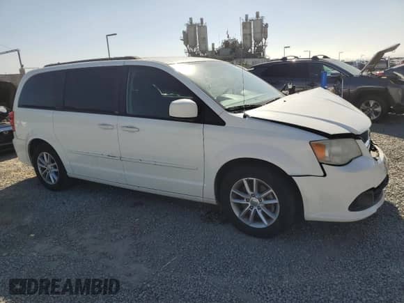 2013 Dodge Grand Caravan SXT with VIN 2C4RDGCG9DR618622, listed as a Copart auction lot 90457375 with 181,498 mi miles and Salvage title. Bid and sale history available at DreamBid. Image 4.