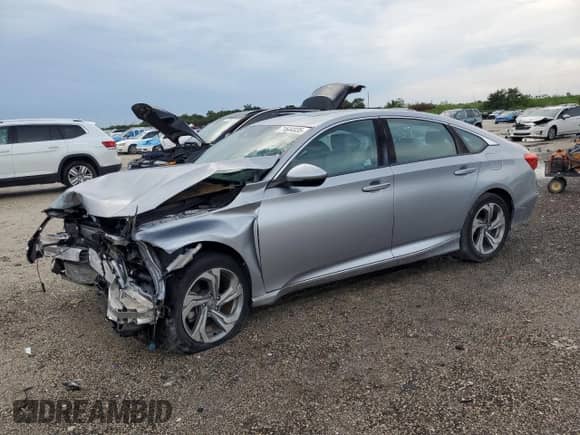 2018 Honda Accord EX-L с VIN 1HGCV1F51JA089646, выставлен на аукционе Copart как лот 71644035 с пробегом Не указан миль и Списание • Salvage title. История ставок и продаж доступна на DreamBid. Изображение 1.
