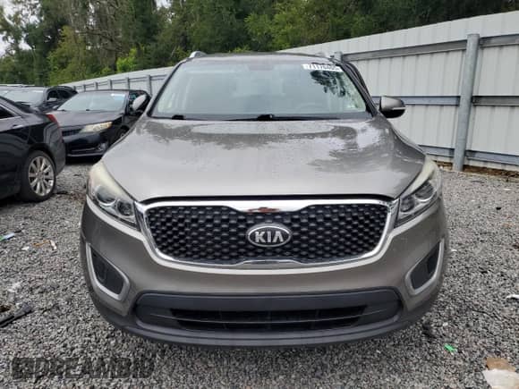 2018 Kia Sorento LX with VIN 5XYPG4A59JG387414, listed as a Copart auction lot 71170405 with 57,435 mi miles and Salvage title. Bid and sale history available at DreamBid. Image 5.
