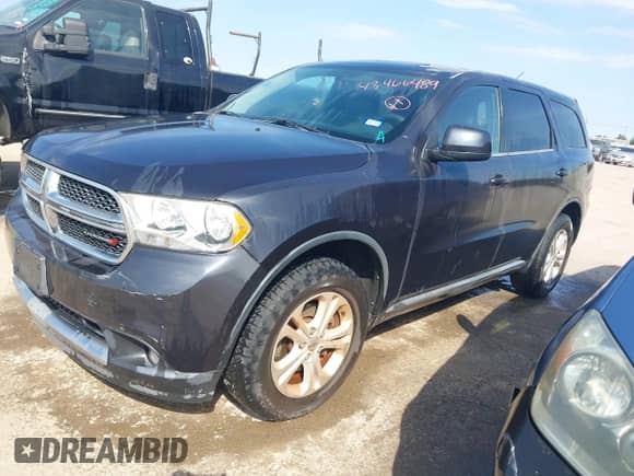 2013 Dodge Durango SXT with VIN 1C4RDHAG2DC699755, listed as a IAAI auction lot 43466489 with 156,941 mi miles and . Bid and sale history available at DreamBid. Image 17.