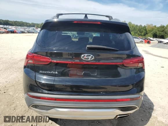 2021 Hyundai Santa Fe SEL z VIN 5NMS24AJ9MH316455, wystawiony jako Copart lot #82165045 z przebiegiem 46 870 mil mil oraz Nie do naprawy • Non repairable. Historia ofert i sprzedaży dostępna na DreamBid. Obrazek 6.