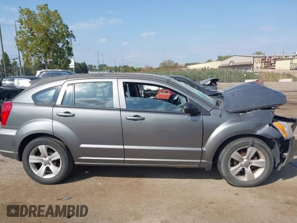 2011 Dodge Caliber Mainstreet z VIN 1B3CB3HA4BD268794, wystawiony jako IAAI lot #43266104 z przebiegiem 159 868 mil mil oraz . Historia ofert i sprzedaży dostępna na DreamBid. Obrazek 13.
