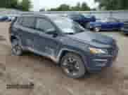 2017 Jeep Compass Trailhawk with VIN 3C4NJDDBXHT688190, listed as a Copart auction lot 63299085 with 104,758 mi miles and Clean title. Bid and sale history available at DreamBid. Image 4.