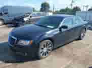 2014 Chrysler 300 S with VIN 2C3CCABT7EH180960, listed as a IAAI auction lot 38901474 with 141,716 mi miles and . Bid and sale history available at DreamBid. Image 2.