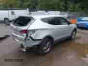 2018 Hyundai Santa Fe 2.4L с VIN 5XYZTDLB0JG533030, выставлен на аукционе IAAI как лот 43434007 с пробегом 124 135 миль миль и . История ставок и продаж доступна на DreamBid. Изображение 4.