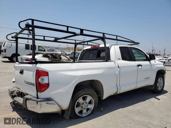 2019 Toyota Tundra SR с VIN 5TFRM5F14KX143150, выставлен на аукционе Copart как лот 63068995 с пробегом Не указан миль и Списание • Salvage title. История ставок и продаж доступна на DreamBid. Изображение 3.