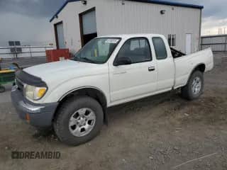1998 Toyota Tacoma z VIN 4TAWN72N2WZ052890, wystawiony jako Copart lot #65763015 z przebiegiem 225 801 mil mil oraz Szkoda całkowita • Salvage title. Historia ofert i sprzedaży dostępna na DreamBid. Obrazek 1.