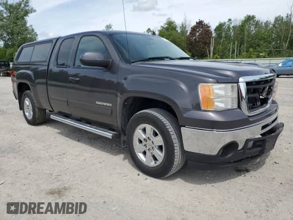2011 GMC Sierra 1500 SLT with VIN 1GTR2WE38BZ274746, listed as a Copart auction lot 61145545 with 187,111 mi miles and Salvage title. Bid and sale history available at DreamBid. Image 4.