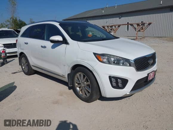 2016 Kia Sorento SXL z VIN 5XYPKDA53GG086158, wystawiony jako IAAI lot #43352887 z przebiegiem 168 301 mil mil oraz . Historia ofert i sprzedaży dostępna na DreamBid. Obrazek 1.