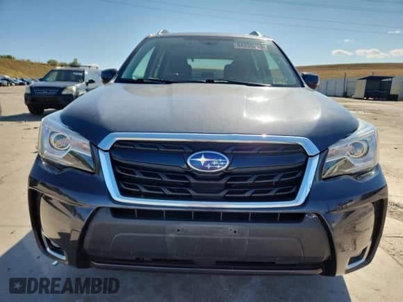 2017 Subaru Forester Touring z VIN JF2SJGWC1HH551911, wystawiony jako Copart lot #84236215 z przebiegiem 59 041 mil mil oraz Czysty tytuł • Clean title. Historia ofert i sprzedaży dostępna na DreamBid. Obrazek 5.