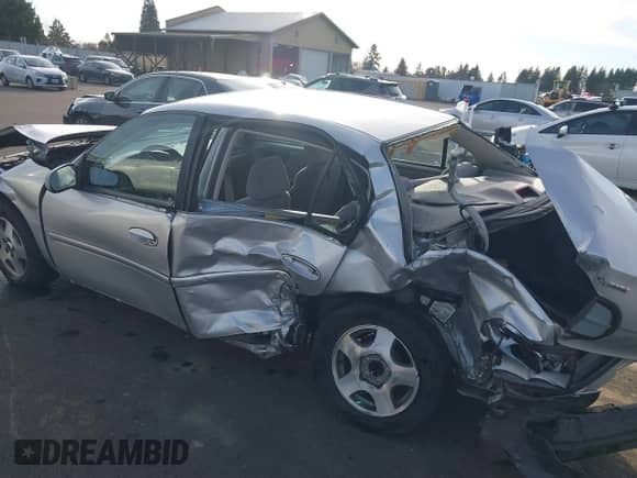 2005 Chevrolet Malibu Classic z VIN 1G1ND52F55M194185, wystawiony jako IAAI lot #41534541 z przebiegiem Nie podano mil oraz . Historia ofert i sprzedaży dostępna na DreamBid. Obrazek 6.