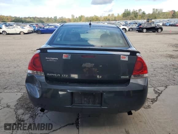 2012 Chevrolet Impala LTZ z VIN 2G1WC5E35C1235688, wystawiony jako Copart lot #83750805 z przebiegiem 132 019 mil mil oraz Szkoda całkowita • Salvage title. Historia ofert i sprzedaży dostępna na DreamBid. Obrazek 6.