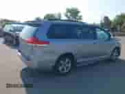 2012 Toyota Sienna LE AAS with VIN 5TDKK3DC3CS228293, listed as a IAAI auction lot 43269791 with 96,848 mi miles and . Bid and sale history available at DreamBid. Image 4.
