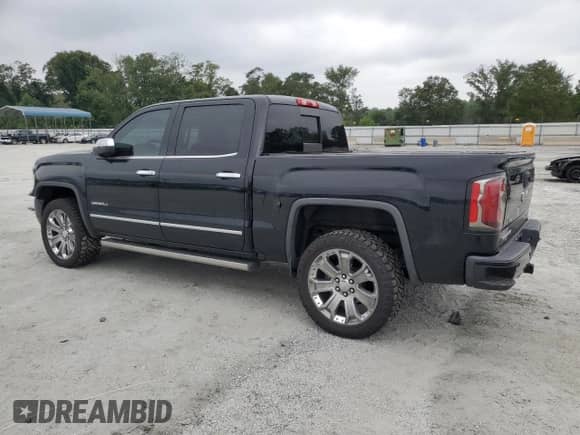 2017 GMC Sierra 1500 Denali z VIN 3GTU2PEJ7HG378569, wystawiony jako Copart lot #69472685 z przebiegiem 96 551 mil mil oraz Szkoda całkowita • Salvage title. Historia ofert i sprzedaży dostępna na DreamBid. Obrazek 2.
