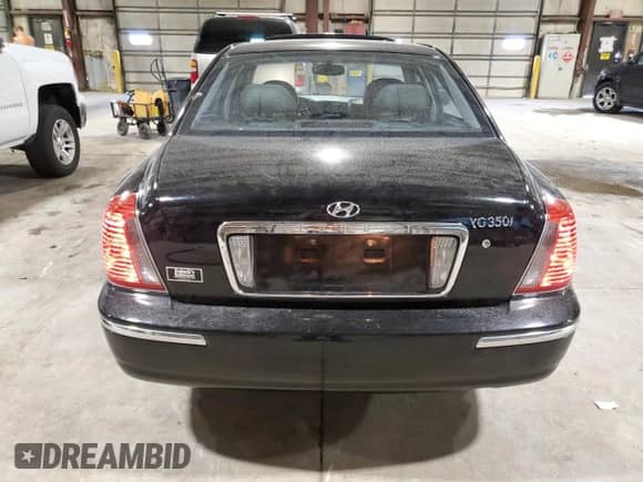 2005 Hyundai XG с VIN KMHFU45EX5A422512, выставлен на аукционе Copart как лот 61636165 с пробегом 128 354 миль миль и Списание • Salvage title. История ставок и продаж доступна на DreamBid. Изображение 6.