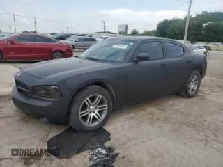 2008 Dodge Charger Police with VIN 2B3KA43H68H279753, listed as a Copart auction lot 57951655 with 199,443 mi miles and Clean title. Bid and sale history available at DreamBid. Image 1.