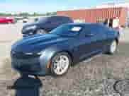 2021 Chevrolet Camaro 1LS with VIN 1G1FB1RX5M0130963, listed as a IAAI auction lot 43284790 with 57,472 mi miles and . Bid and sale history available at DreamBid. Image 2.