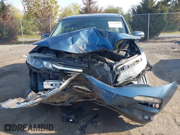 2016 Honda Pilot EX-L with VIN 5FNYF6H59GB125482, listed as a IAAI auction lot 43246080 with 132,677 mi miles and . Bid and sale history available at DreamBid. Image 12.