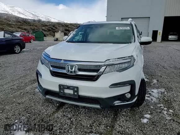 2020 Honda Pilot Touring 8-Passenger z VIN 5FNYF6H92LB030789, wystawiony jako Copart lot #48794445 z przebiegiem 63 640 mil mil oraz Szkoda całkowita • Salvage title. Historia ofert i sprzedaży dostępna na DreamBid. Obrazek 12.