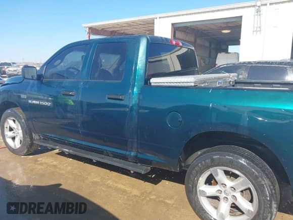 2011 Ram 1500 SLT with VIN 1D7RV1GT9BS531533, listed as a IAAI auction lot 41463005 with 201,299 mi miles and . Bid and sale history available at DreamBid. Image 14.