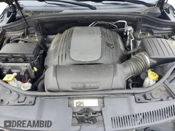 2014 Dodge Durango Citadel z VIN 1C4SDJET9EC435191, wystawiony jako Copart lot #58572665 z przebiegiem 168 478 mil mil oraz Szkoda całkowita • Salvage title. Historia ofert i sprzedaży dostępna na DreamBid. Obrazek 12.