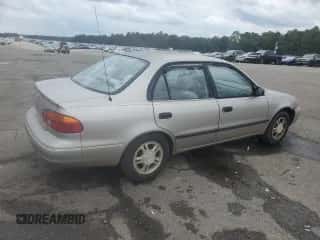 2000 Chevrolet Prizm z VIN 1Y1SK5283YZ422625, wystawiony jako Copart lot #82153385 z przebiegiem 154 583 mil mil oraz Szkoda całkowita • Salvage title. Historia ofert i sprzedaży dostępna na DreamBid. Obrazek 3.