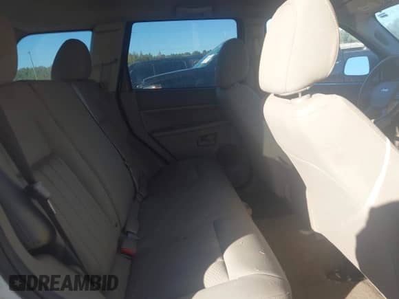 2006 Jeep Grand Cherokee Laredo z VIN 1J4GS48K56C324195, wystawiony jako IAAI lot #43464748 z przebiegiem 227 853 mil mil oraz . Historia ofert i sprzedaży dostępna na DreamBid. Obrazek 8.