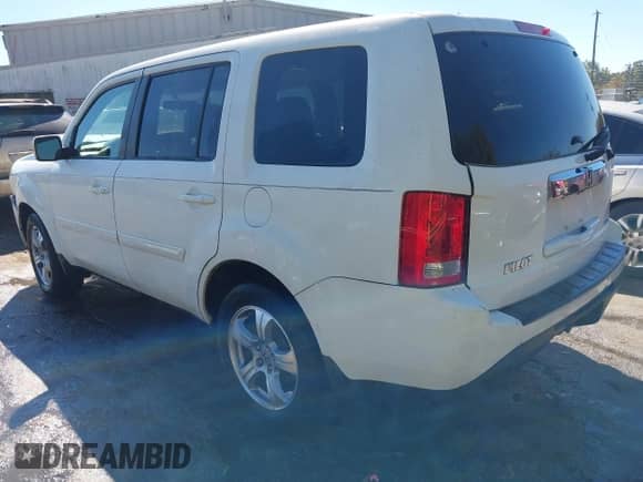 2014 Honda Pilot EX-L with VIN 5FNYF4H5XEB026882, listed as a IAAI auction lot 43473449 with 206,746 mi miles and . Bid and sale history available at DreamBid. Image 3.